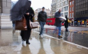 London commuters in pouring rain